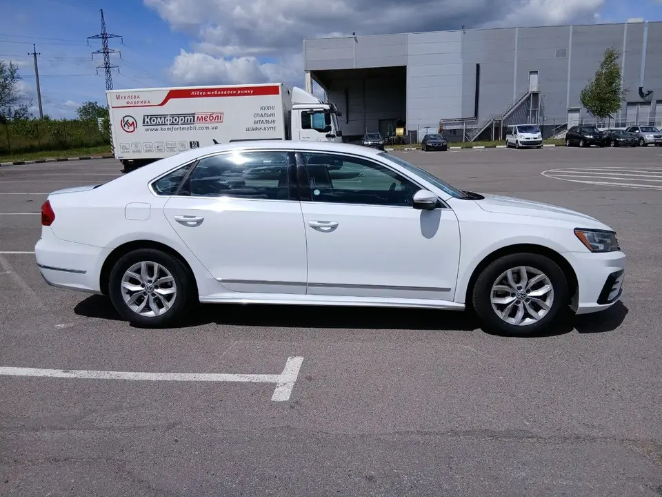 Volkswagen Passat 2016 (white) from the KTRANS rental fleet