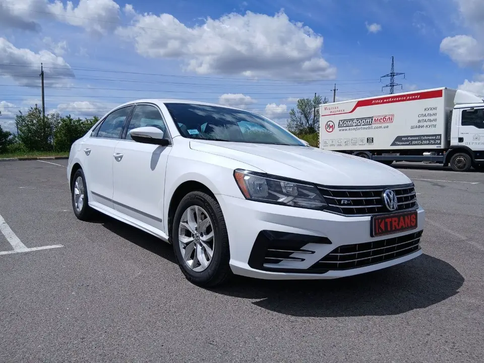 Volkswagen Passat 2016 (white) from the KTRANS rental fleet
