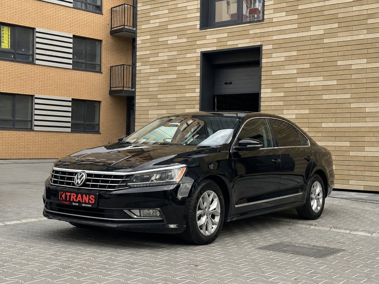 Volkswagen Passat 2016 (чорний) з парку оренди KTRANS