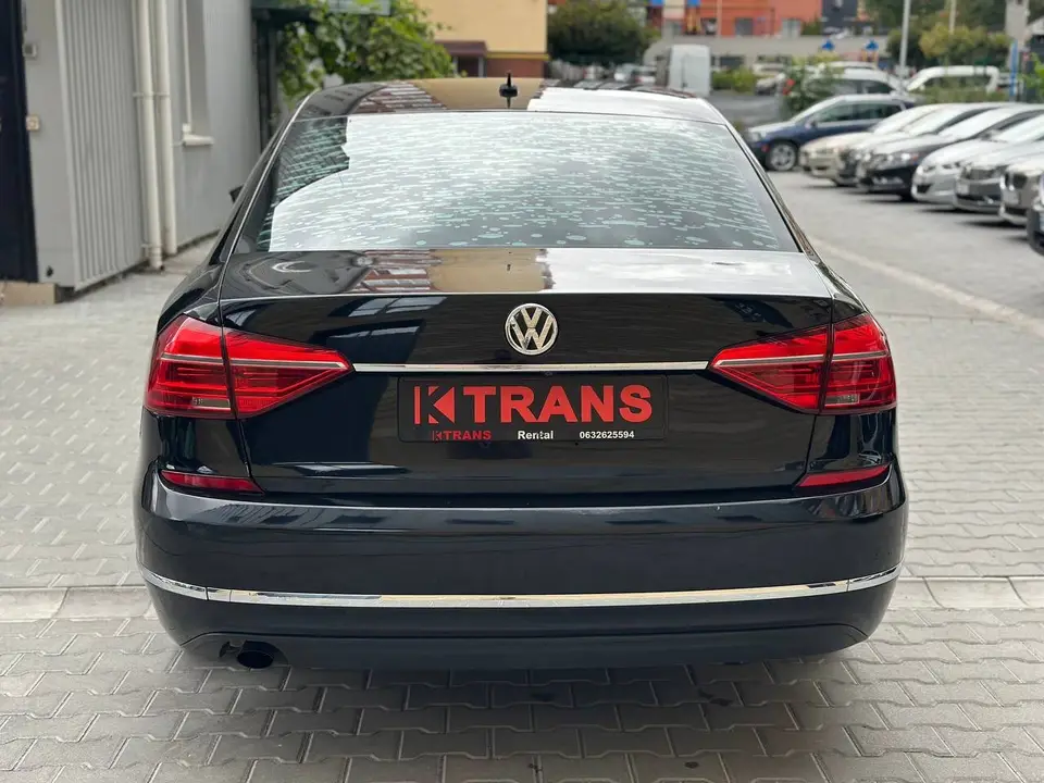 Volkswagen Passat 2016 (чорний) з парку оренди KTRANS