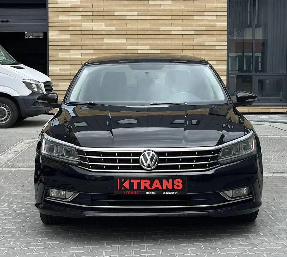 Volkswagen Passat 2016 (чорний) з парку оренди KTRANS