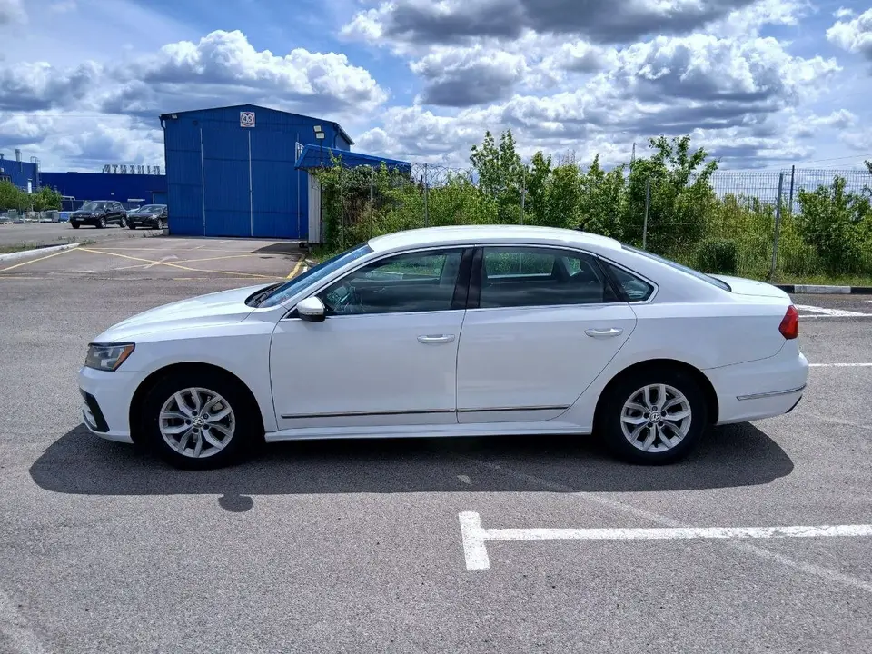 Volkswagen Passat 2016 (white) from the KTRANS rental fleet