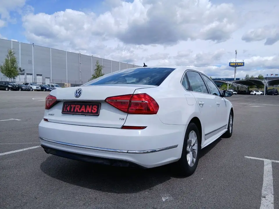 Volkswagen Passat 2016 (white) from the KTRANS rental fleet